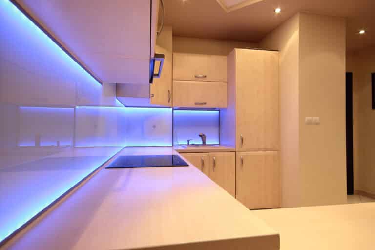 Modern luxury kitchen with purple LED lighting